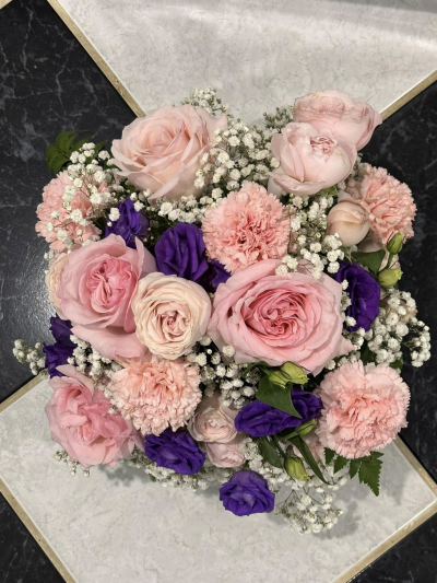 Twilight Whispers - Graceful and enchanting arrangement that blends the soft charm of blush pink with the striking allure of deep violet. Perfect for expressing admiration, sympathy, or simply adding a touch of elegance to any occasion, it’s a stunning mix of tenderness and twilight tones.